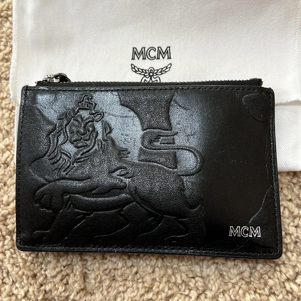 MCM men's lion embossed black with blue and grey mini zipped coin card holder